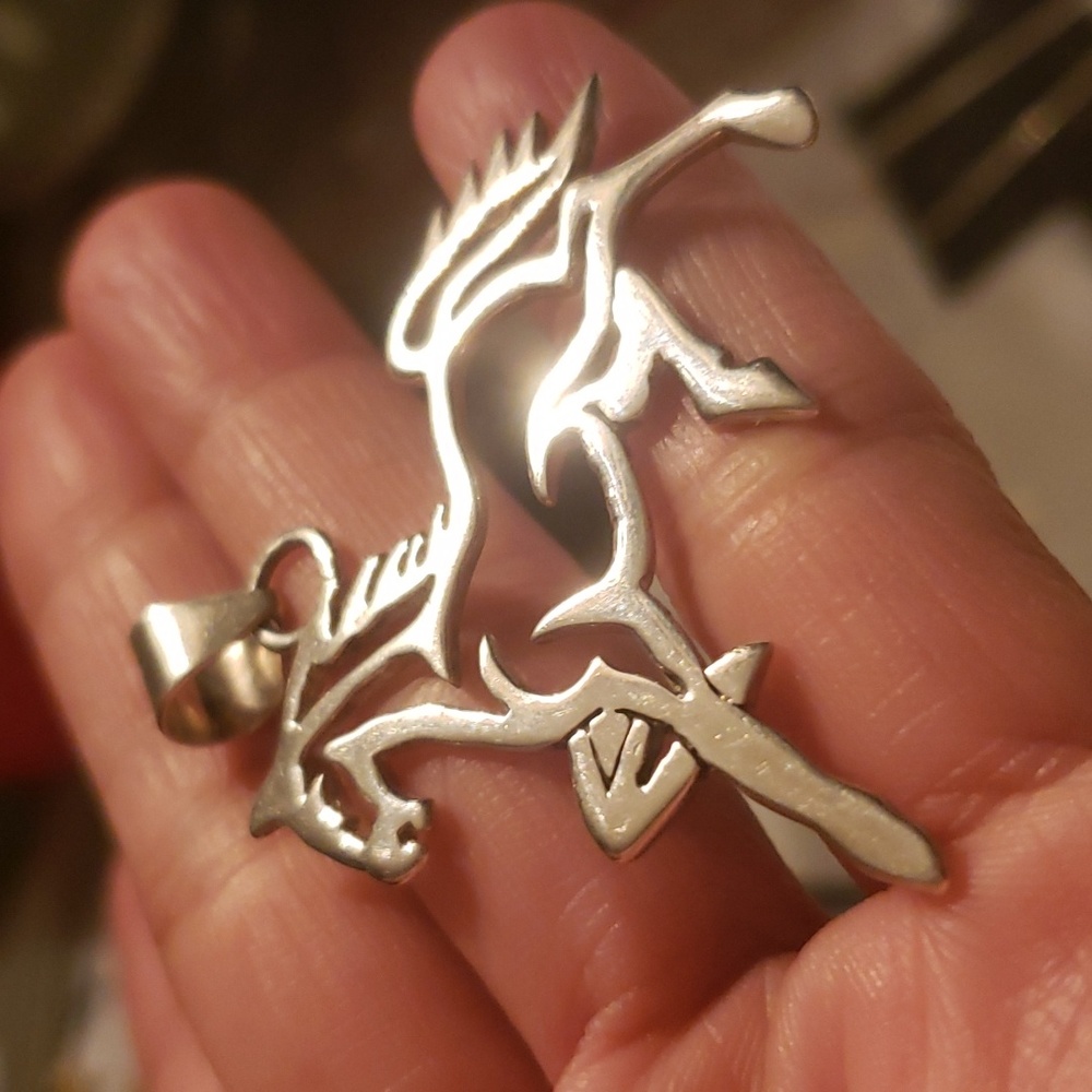 VINTAGE STERLING SILVER MUSTANG HORSE PENDANT